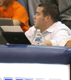 Moore at the stat table during a volleyball match.
